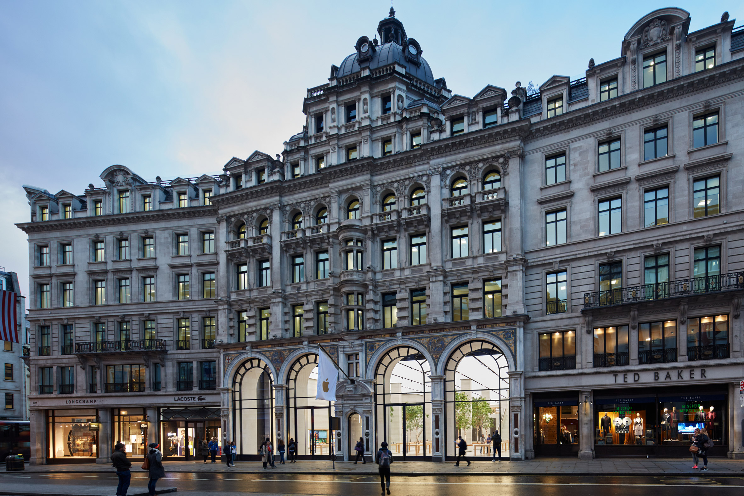 Apple's new store in London has reopened following a major renovation by Foster + Partners that incorporates the tech giant's new approach to retail. The Regent Street store – Apple's first outpost in Europe when it opened in 2004 – was closed for a lengthy period while it was revamped according to the company's new interior design format.