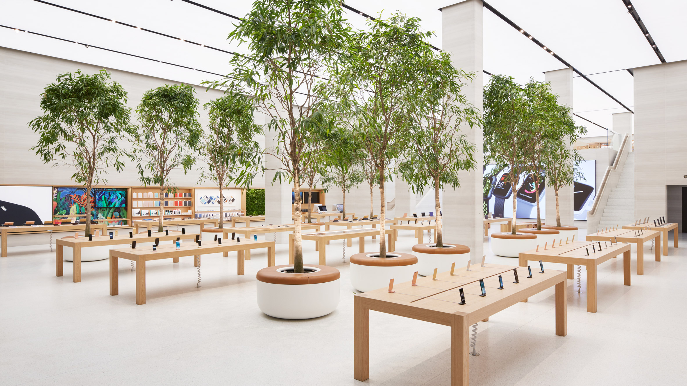Apple's new store in London has reopened following a major renovation by Foster + Partners that incorporates the tech giant's new approach to retail. The Regent Street store – Apple's first outpost in Europe when it opened in 2004 – was closed for a lengthy period while it was revamped according to the company's new interior design format.