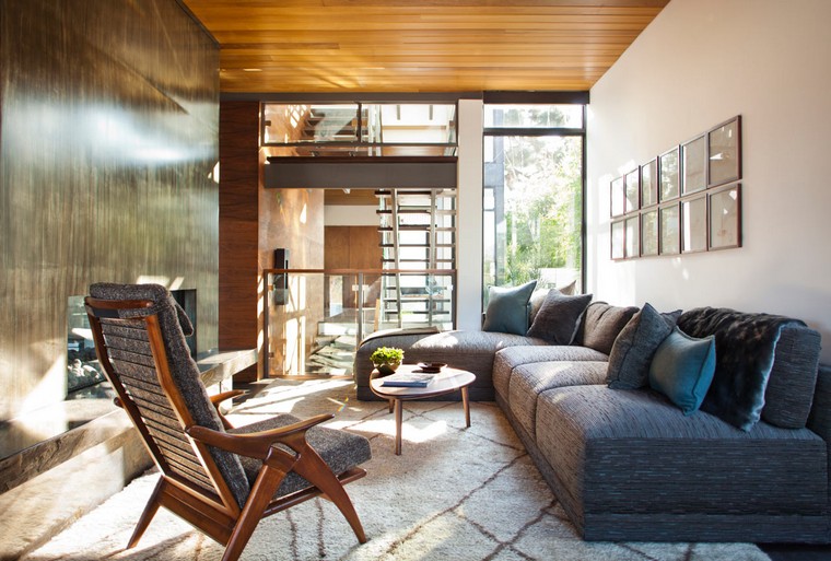 The Adelaide Midcentury Modern House is one of Ray Kappe’s prefab Livinghomes that’s made up of 11 modules installed on a beautiful lot in Santa Monica over the course of just two days. With a focus on indoor/outdoor living, the design is split over multiple levels that help define certain areas while remaining open and light. Complementing the home’s style are the warm, modern interiors that were designed by DKD LTD.