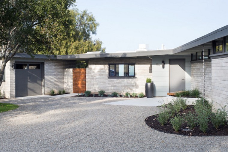 Klopf Architecture, Outer Space Landscape Architects, and Flegels Construction recently tackled the renovation of a classic midcentury modern home originally designed by Ellis Jacobs, an apprentice of Frank Lloyd Wright. Originally built by its owners, the 1960s home featured lots of exposed concrete and framing, giving it a rough industrial look.