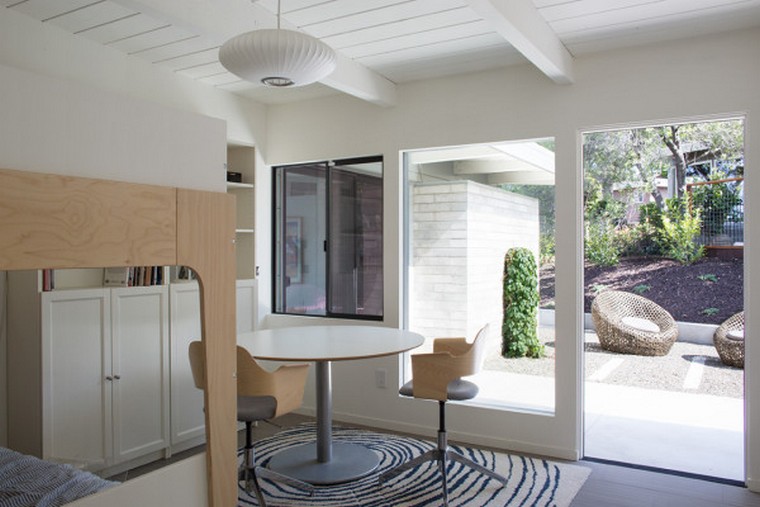 Klopf Architecture, Outer Space Landscape Architects, and Flegels Construction recently tackled the renovation of a classic midcentury modern home originally designed by Ellis Jacobs, an apprentice of Frank Lloyd Wright. Originally built by its owners, the 1960s home featured lots of exposed concrete and framing, giving it a rough industrial look.