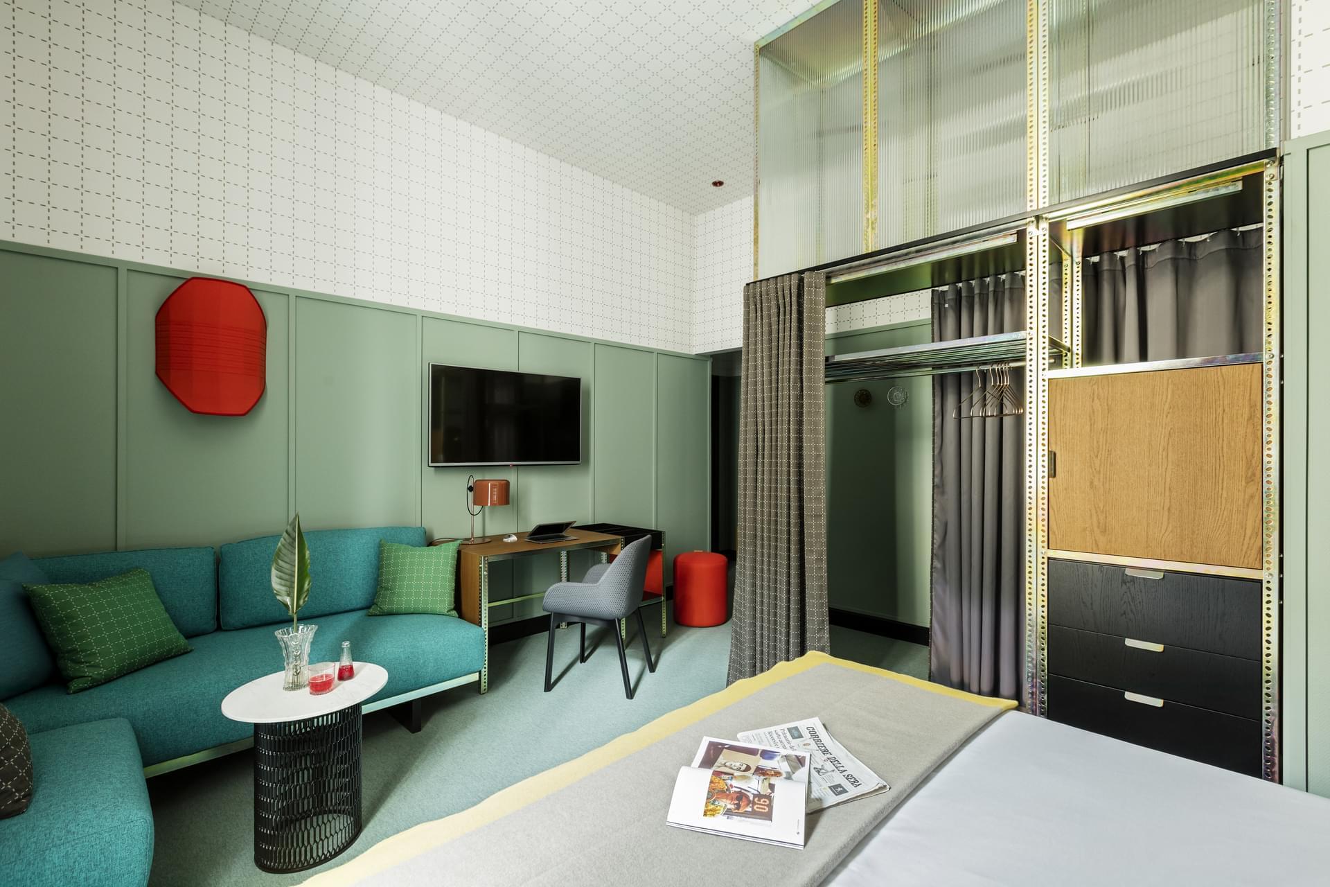Patricia Urquiola designs a colorful Hotel Room Mate Giulia in Milan | You can visit us at our website, www.sornixelvuta.pro and check our Pinterest @midcenturyblog to get more #MidCenturyModern inspiration.