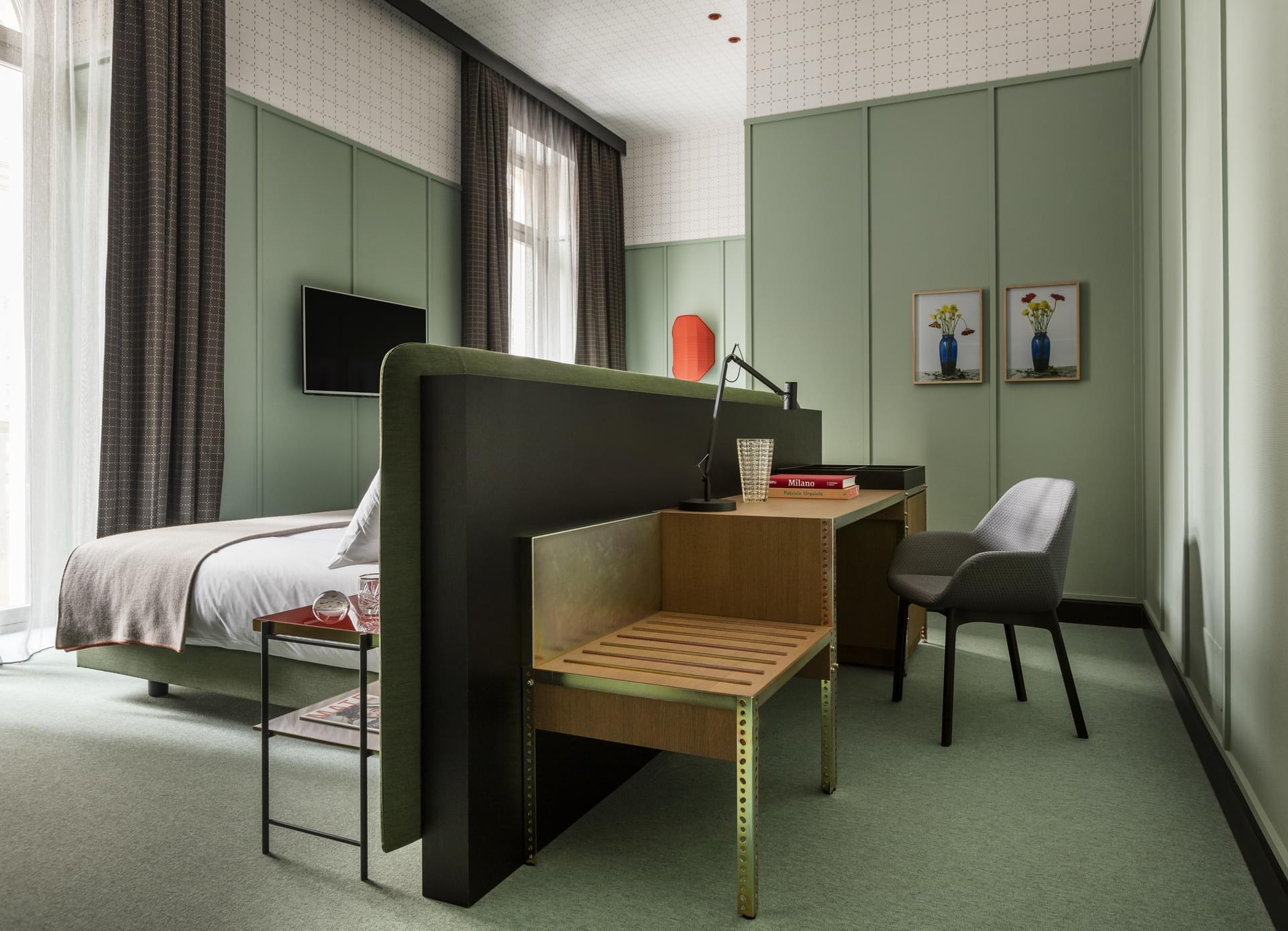 Patricia Urquiola designs a colorful Hotel Room Mate Giulia in Milan | You can visit us at our website, www.sornixelvuta.pro and check our Pinterest @midcenturyblog to get more #MidCenturyModern inspiration.