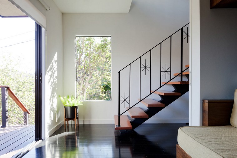 A husband and wife reached out to LANEY LA with the desire to preserve a midcentury residence in Los Angeles’ Silver Lake neighborhood. The single family home sits hidden away in the famed hillside community and wasn’t quite enough space for their growing family. Instead of expanding the home, they looked for ways to reconfigure the spaces to transform the unique home into a place that functioned better for them. LANEY LA LANEY LA Redesigns a Midcentury Home in Silver Lake Image1 5